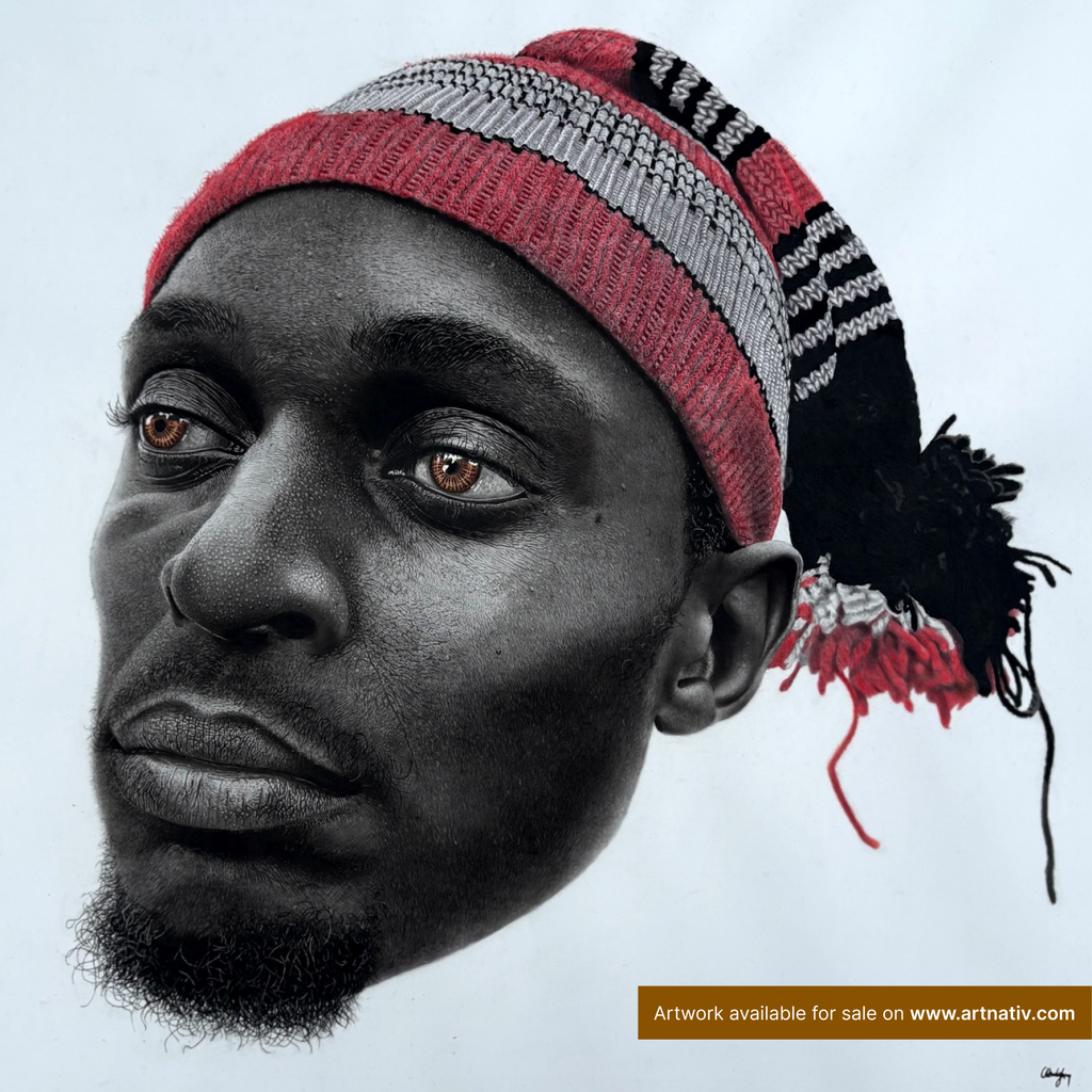 Portrait drawing of a Black man wearing a red, grey, and black knit hat, rendered in detailed monochrome.