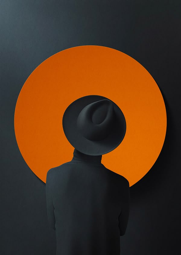 Silhouette of a person wearing a wide-brimmed hat, seen from behind against a bold orange circle on a dark background.